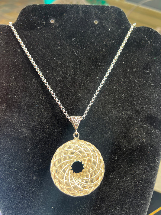 Rare rainbow phenakite jewelry pendant with intricate silver chain from iPyramids