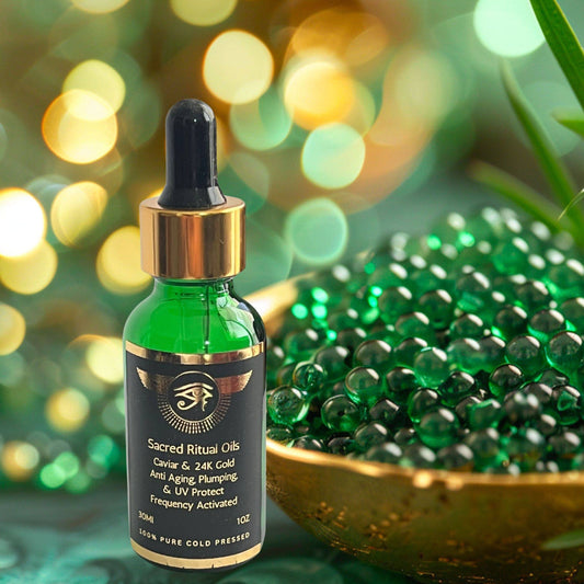 Sacred Ritual Oils green caviar skincare serum with 24k gold in green dropper bottle beside green caviar beads
