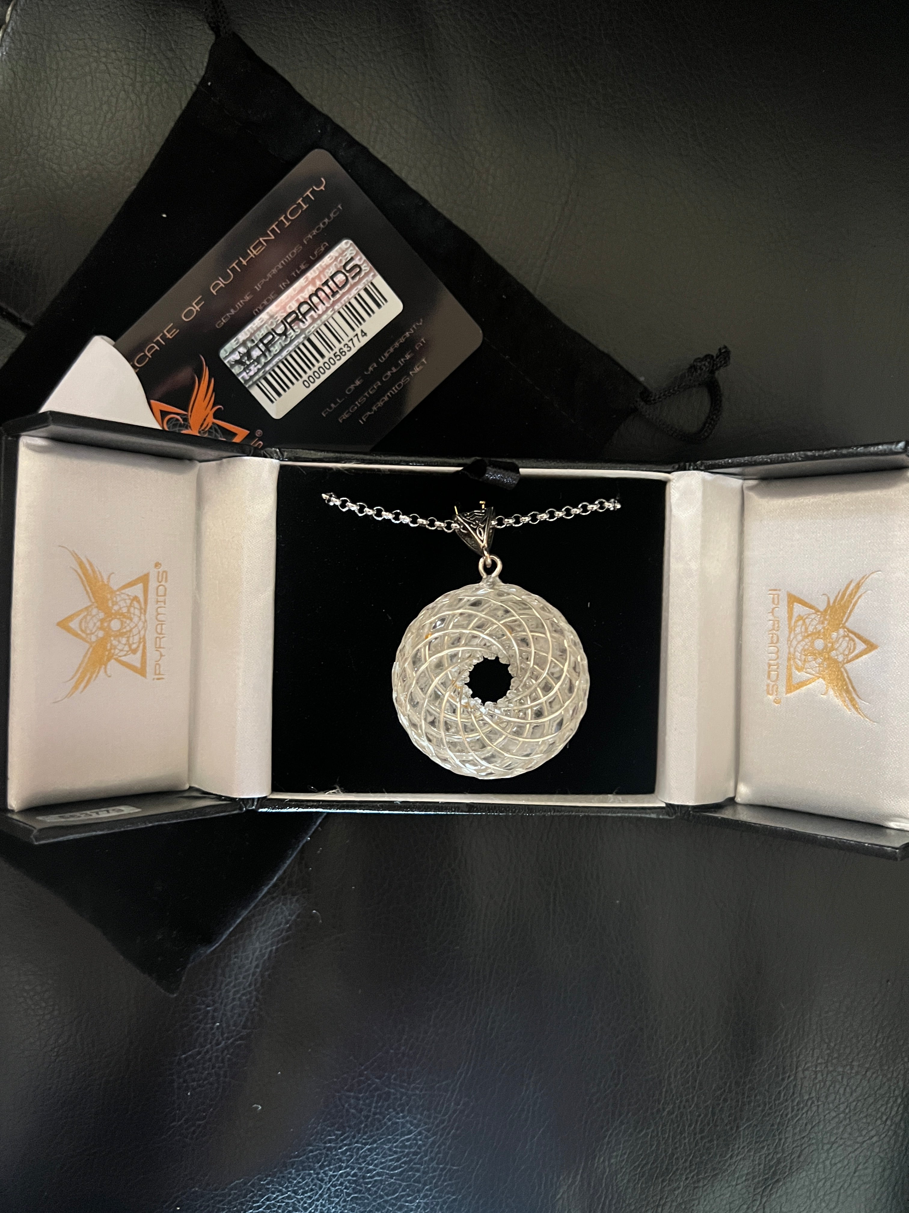 iPyramids rare rainbow phenakite jewelry silver circular pendant necklace in black and white box